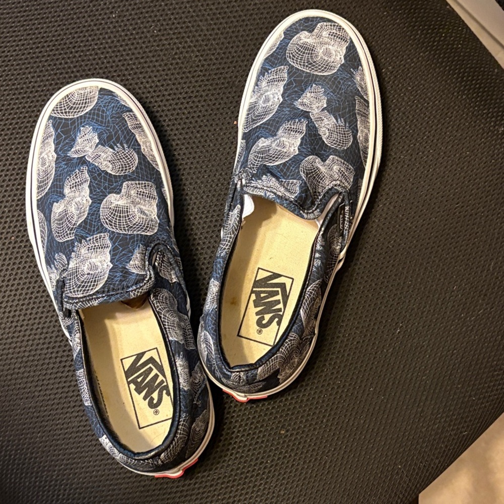 Vans Women's Slip-On Sneakers in Navy with White Skull Print